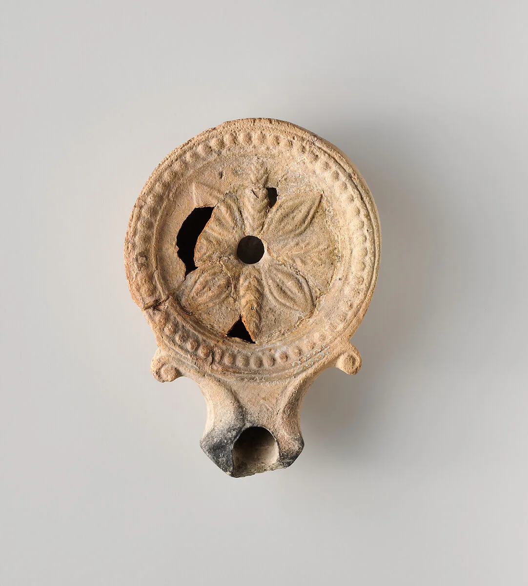 Terracotta oil lamp — Unknown