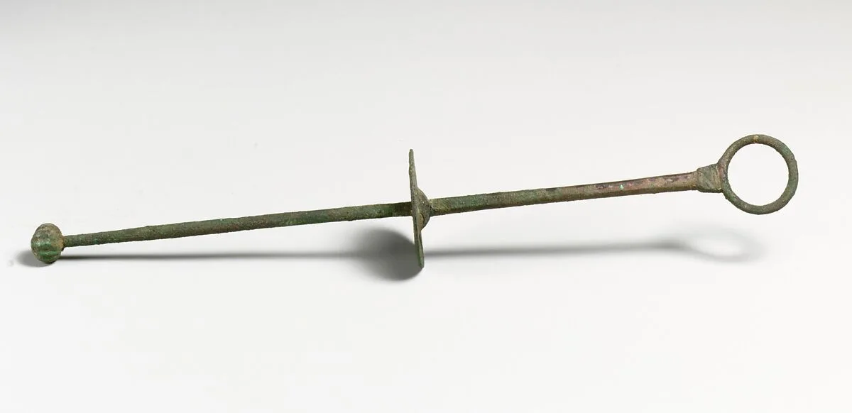 Bronze stirring rod — Unknown