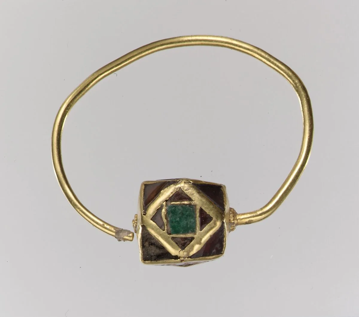 One of a Pair of Gold Cloisonné Earring — Unknown