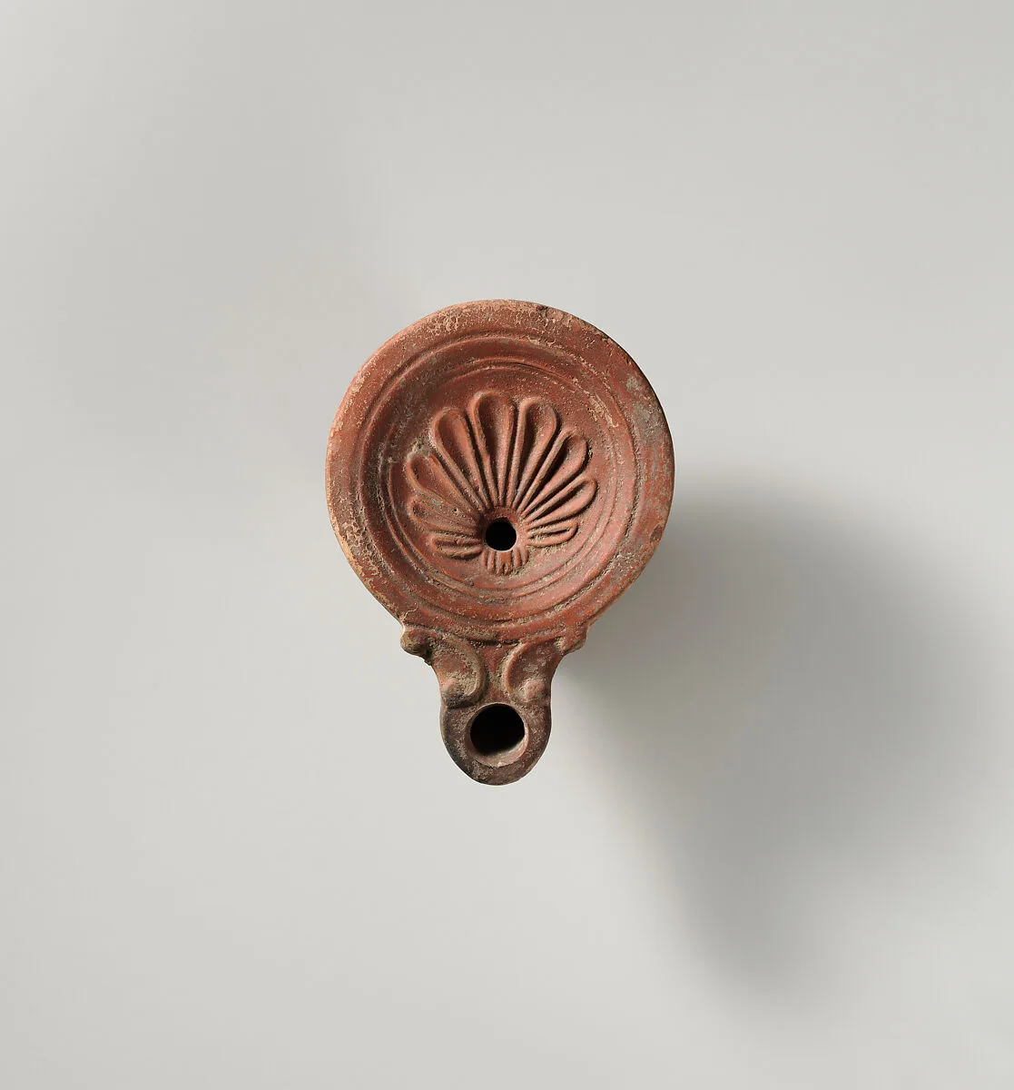 Terracotta oil lamp — Unknown
