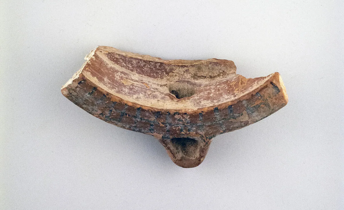 Terracotta lamp nozzle and rim — Unknown
