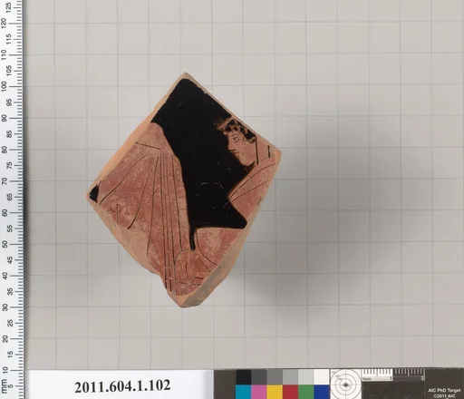 Terracotta fragment of a kylix (drinking cup)