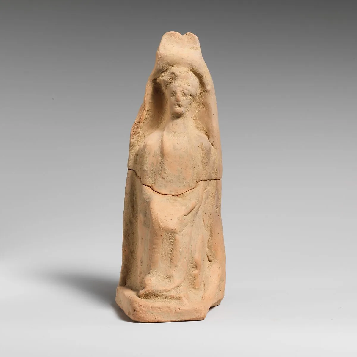 Terracotta statuette of a seated female figure — Unknown