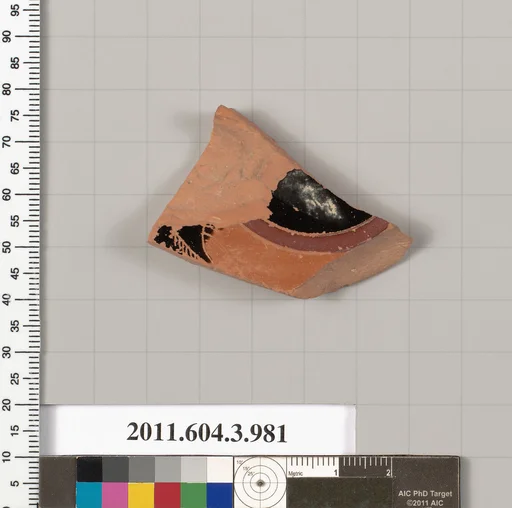 Terracotta fragment of a lekanis lid (covered dish)