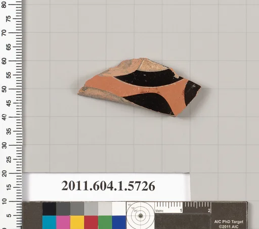 Terracotta fragment of a kylix: eye-cup (drinking cup)
