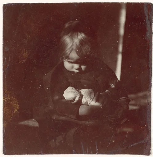[Betty Reynolds with Doll on Lap]