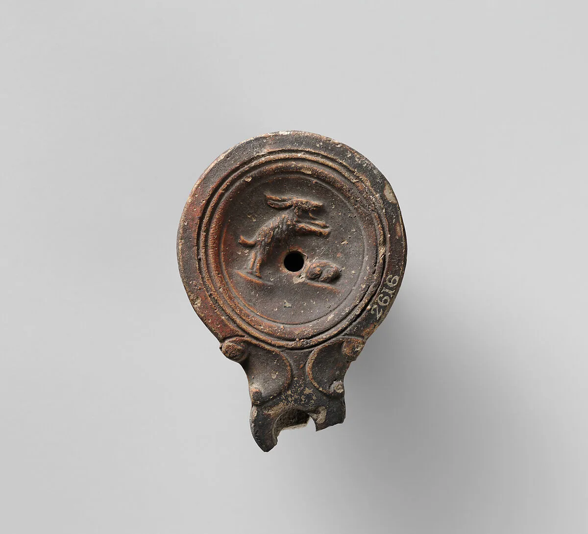 Terracotta oil lamp — Unknown