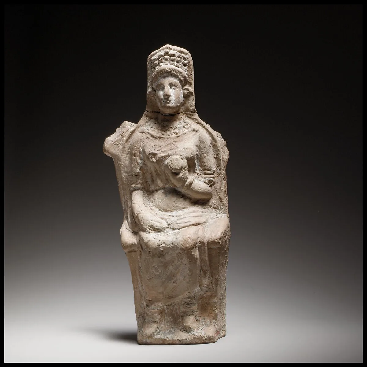 Terracotta figurine of a seated goddess — Unknown