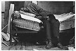 [Man Resting on Sagging Mattress]