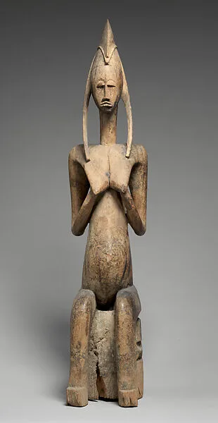 Seated Female Figure — Unknown