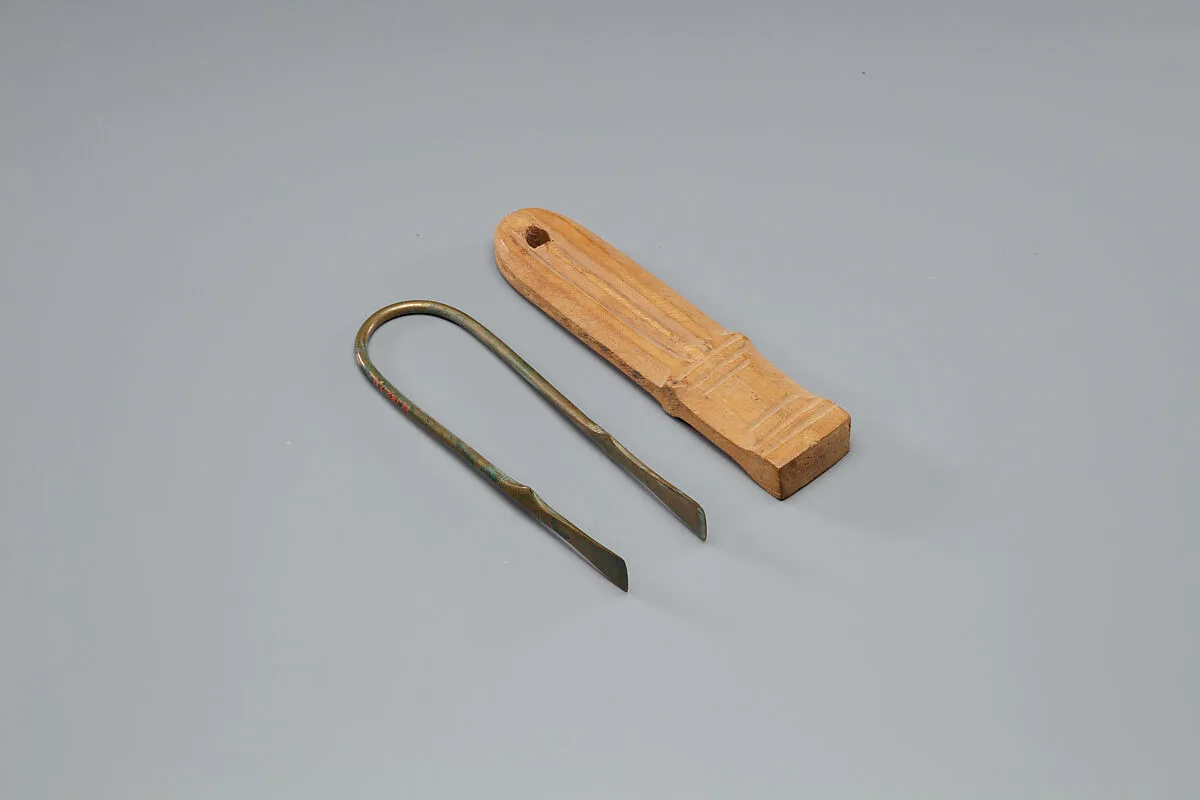Tweezers Mounted on a Wood Block — Unknown