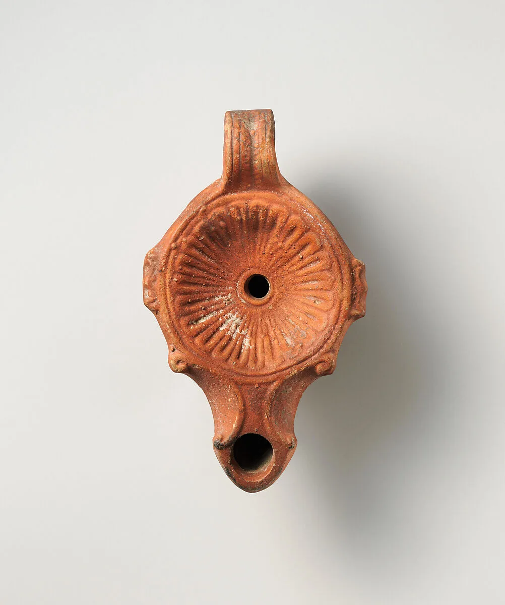 Terracotta oil lamp — Unknown