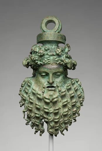 Bronze handle attachment in the form of a mask