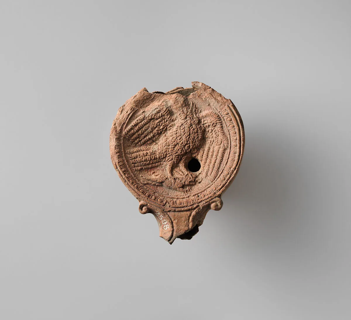 Terracotta oil lamp — Unknown