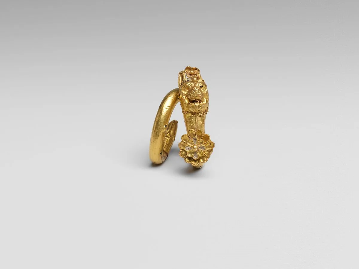 Gilt bronze spiral with lion-griffin terminal — Unknown