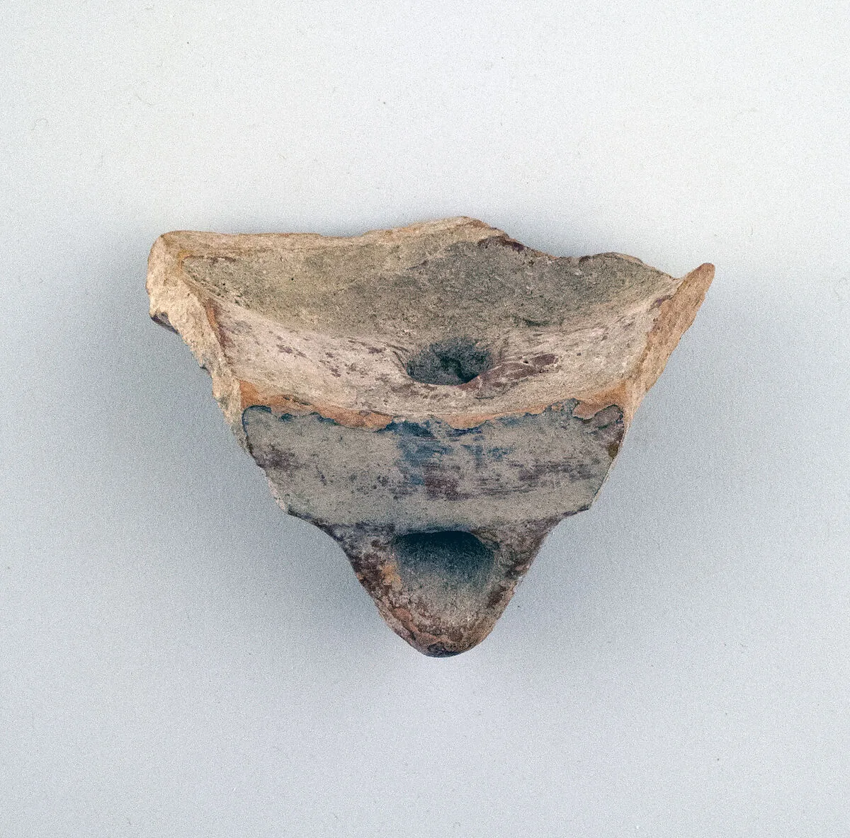 Terracotta lamp nozzle and rim — Unknown