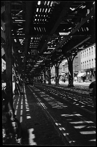 [Street Scene Beneath Elevated Train Tracks, New York City]