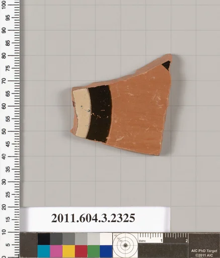 Terracotta fragment of a kylix: eye-cup (drinking cup)