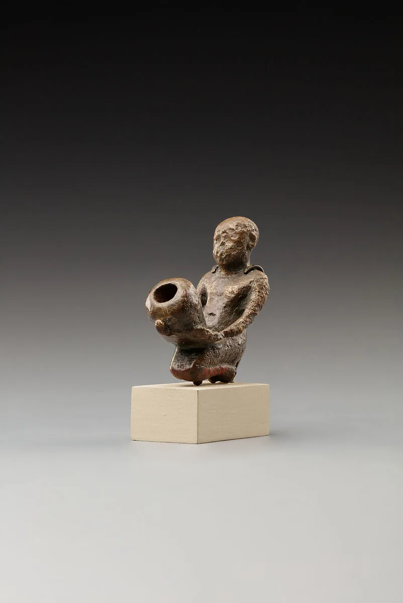 Statuette of a cult attendant with a jar — Unknown