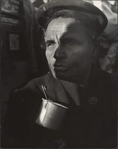 [Blind Man with Tin Cup Attached to Winter Coat, New York]