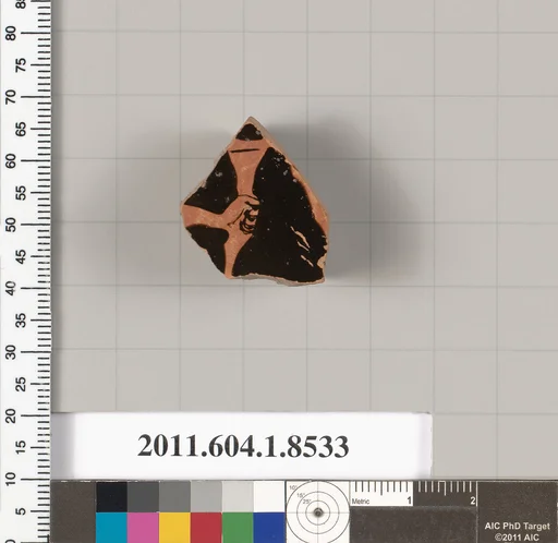 Terracotta fragment of a stemless kylix (drinking cup)