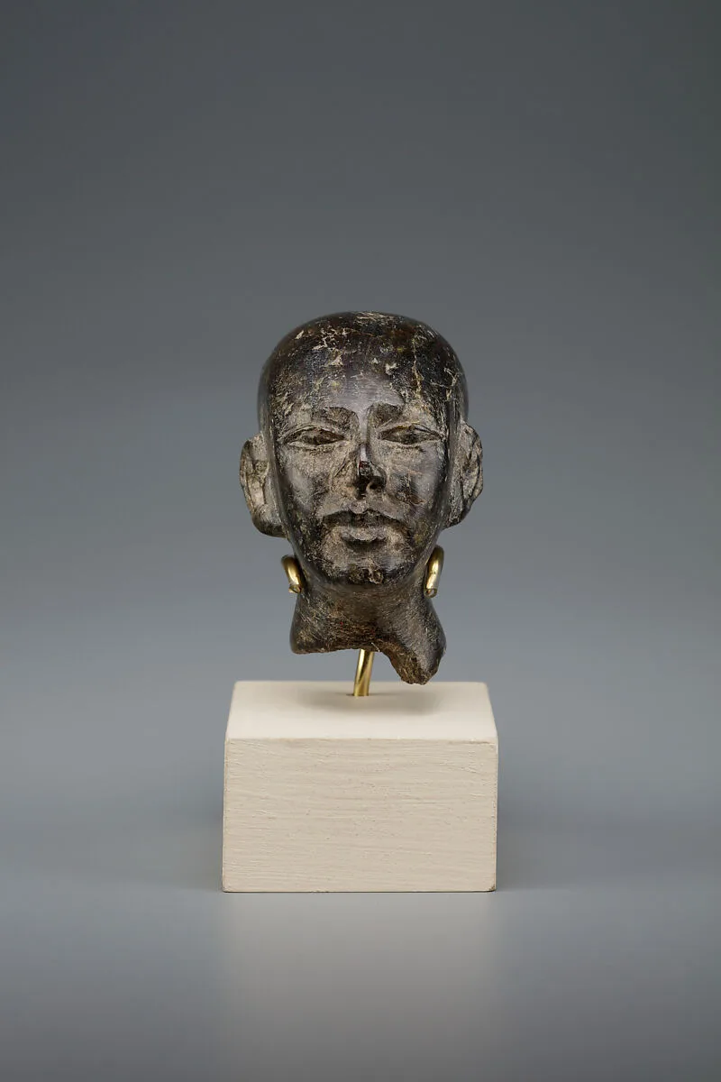 Head of male statue — Unknown