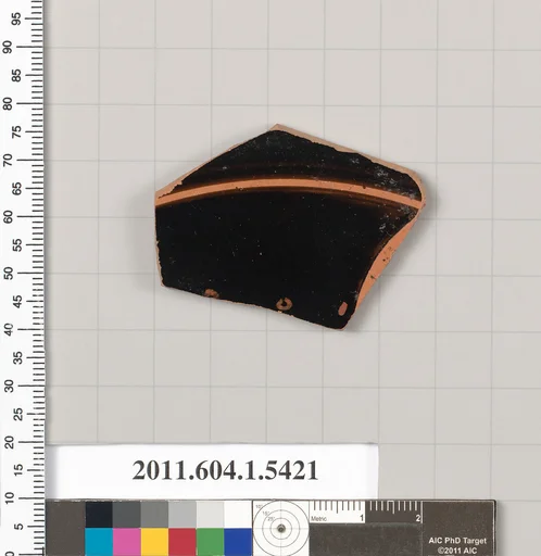 Terracotta fragment of a kylix (drinking cup)