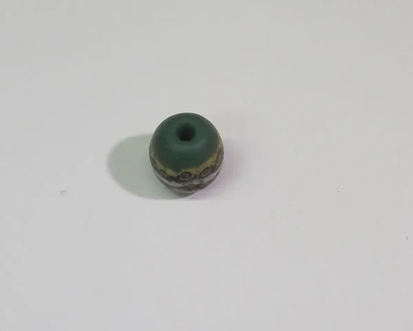 Green bead with applied mosaic strips — Unknown