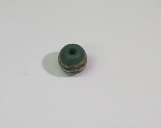 Green bead with applied mosaic strips