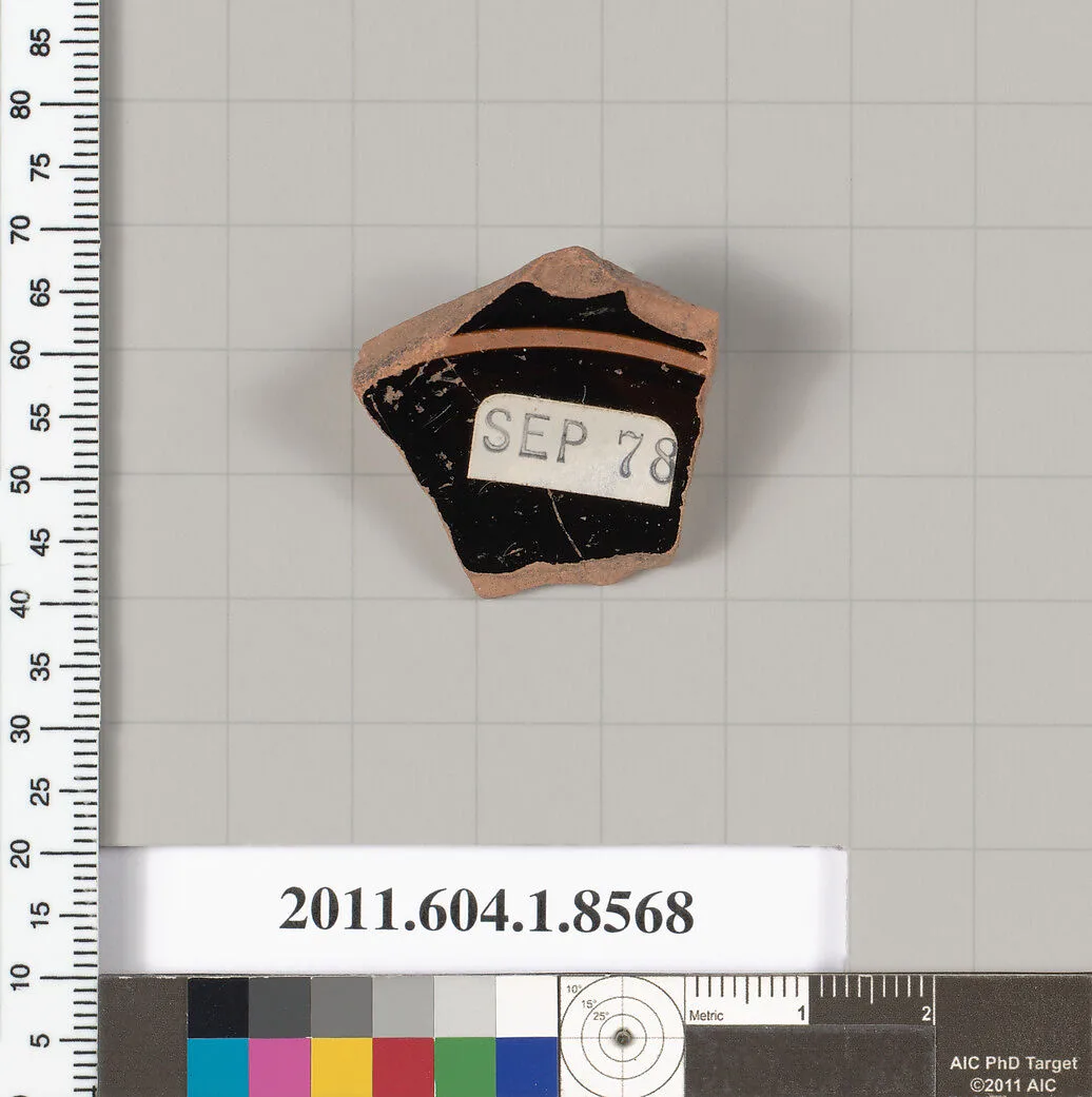 Terracotta fragment of a stemless kylix (drinking cup) — Unknown