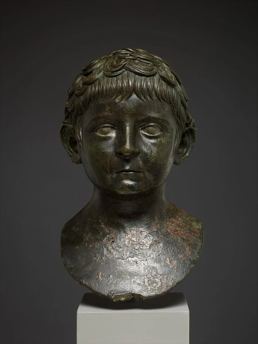 Bronze portrait bust of a young boy — Unknown