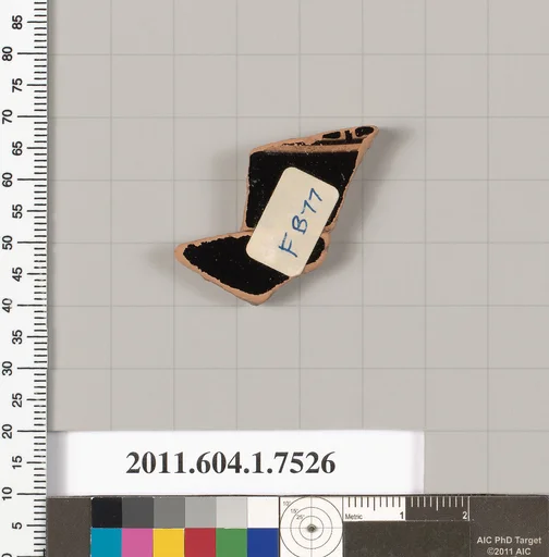 Terracotta fragment of a kylix (drinking cup)