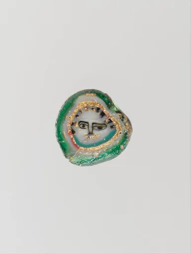 Glass mosaic face bead