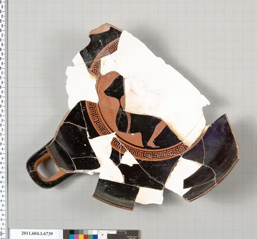 Terracotta fragment of a kylix (drinking cup)