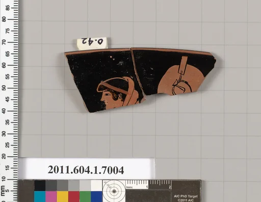 Terracotta rim fragment of a kylix (drinking cup)
