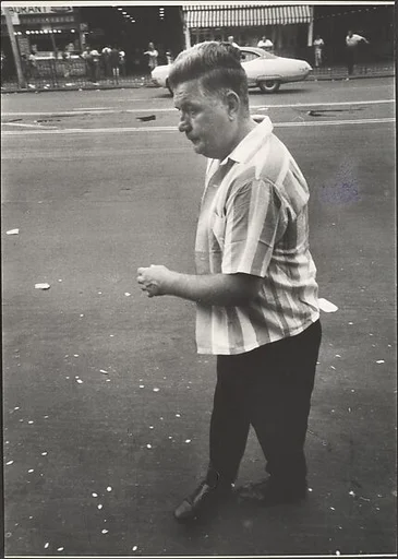[Man Walking on Street in Short-Sleeved Striped Shirt , New York]