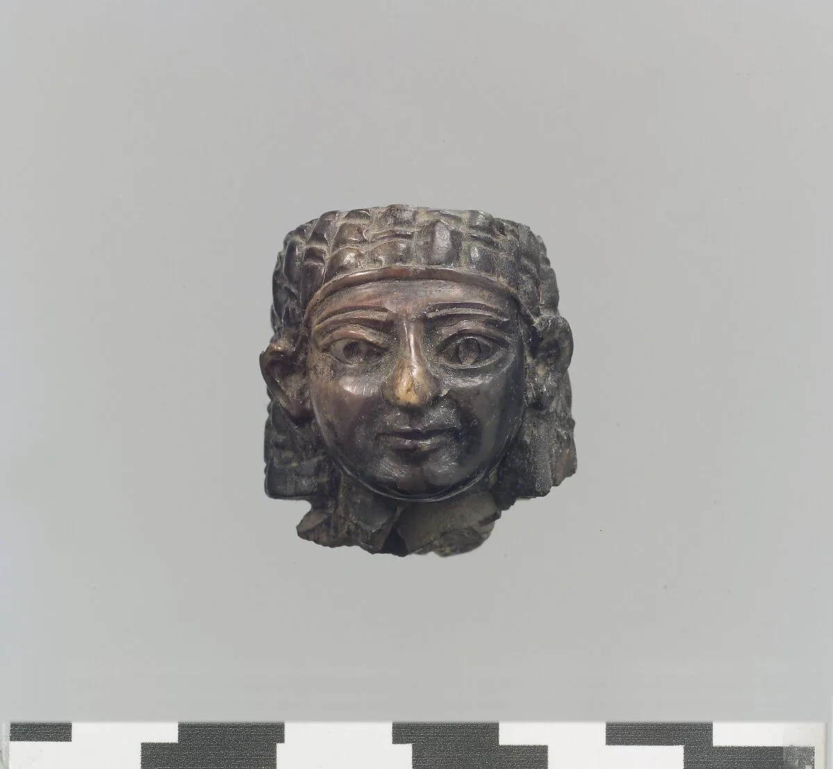 Female head — Unknown