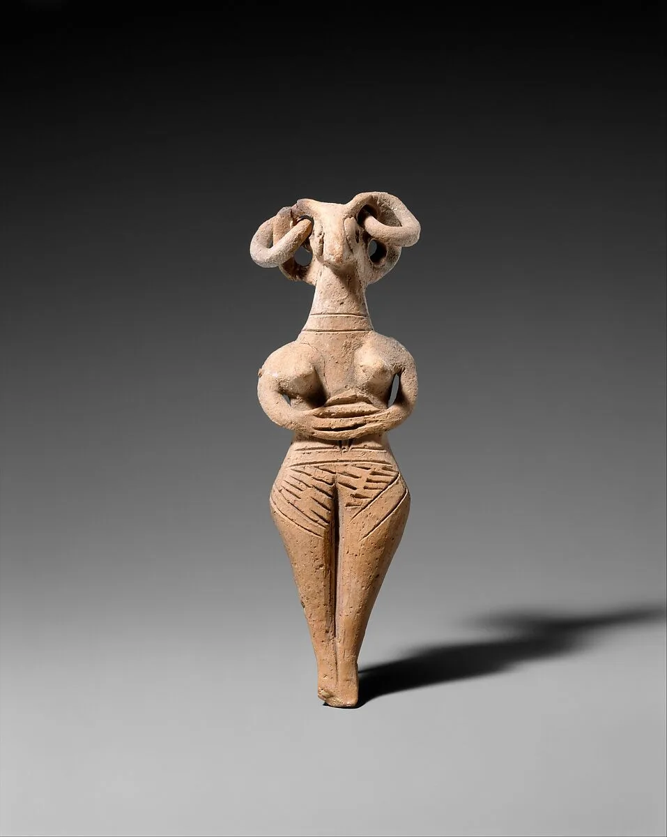 Terracotta statuette of woman with bird face — Unknown