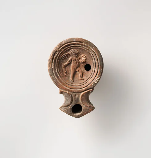 Terracotta oil lamp