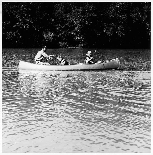 [Three People in Canoe]