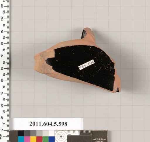 Terracotta fragment of a stemless kylix (drinking cup)