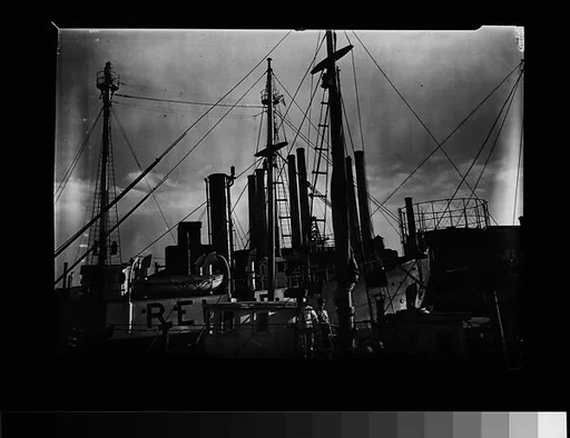 [Port Scene of Ships' Masts, Rigging, and Factory Smokestacks, New York City]