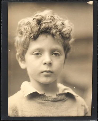 [Unidentified Young Boy]