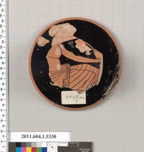 Terracotta fragment of a kylix (drinking cup)