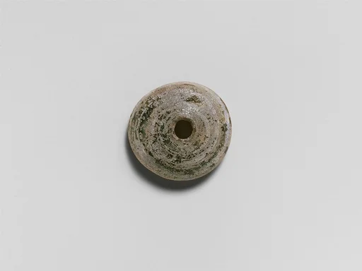 Glass spindle whorl
