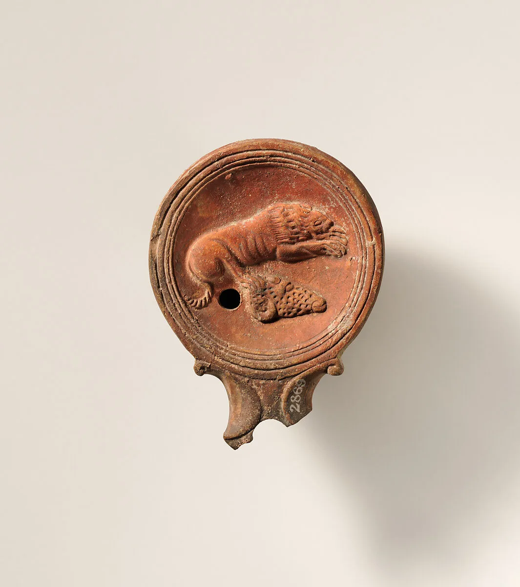 Terracotta oil lamp — Unknown