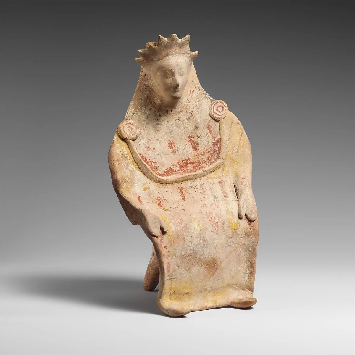 Terracotta statuette of a seated goddess — Unknown