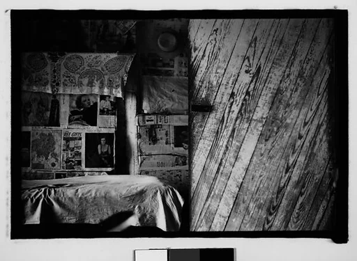 [Bedroom Interior with Newspaper-Covered Walls and Fireplace, Hale County?, Alabama]