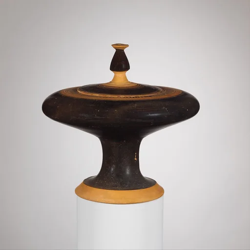 Terracotta plemochoe (vase for perfume)