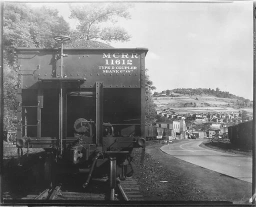 [Pennsylvania Railroad Car Rear in Mining Camp, Osage, West Virginia]